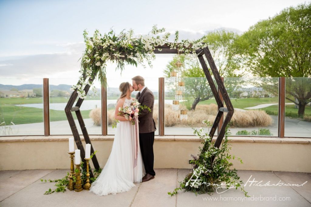 Bride and groom kissing